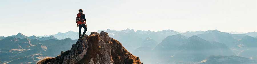 Image man climbing a mountain